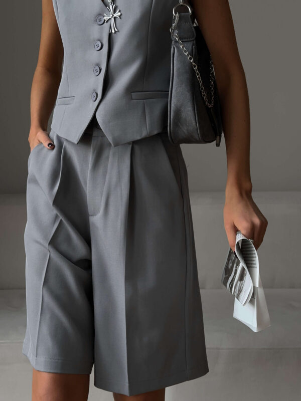 Women's short summer blazer and V-neck button-down set with shorts, perfect for spring and summer seasons